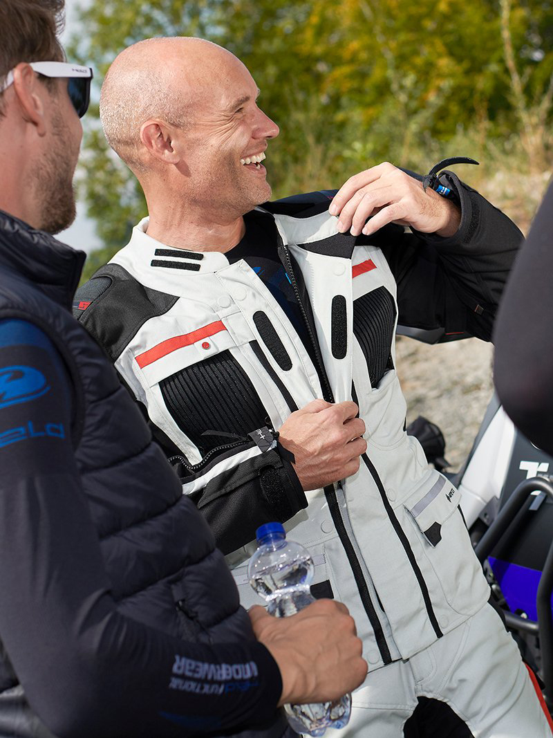 Guy wearing Held Carese Evo Gore-Tex laminated suit